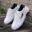 Men's Trendy Solid White Shoes With Feather Pattern, Non Slip Lace Up Low Top Sneakers, Comfy For Outdoor Casual Activities Walking Jogging Traveling